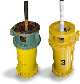 Two yellow cylinders, the left is damaged and the right has been repaired