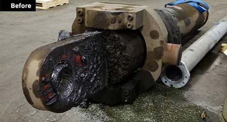 damaged and dirty hydraulic cylinder before being rebuilt
